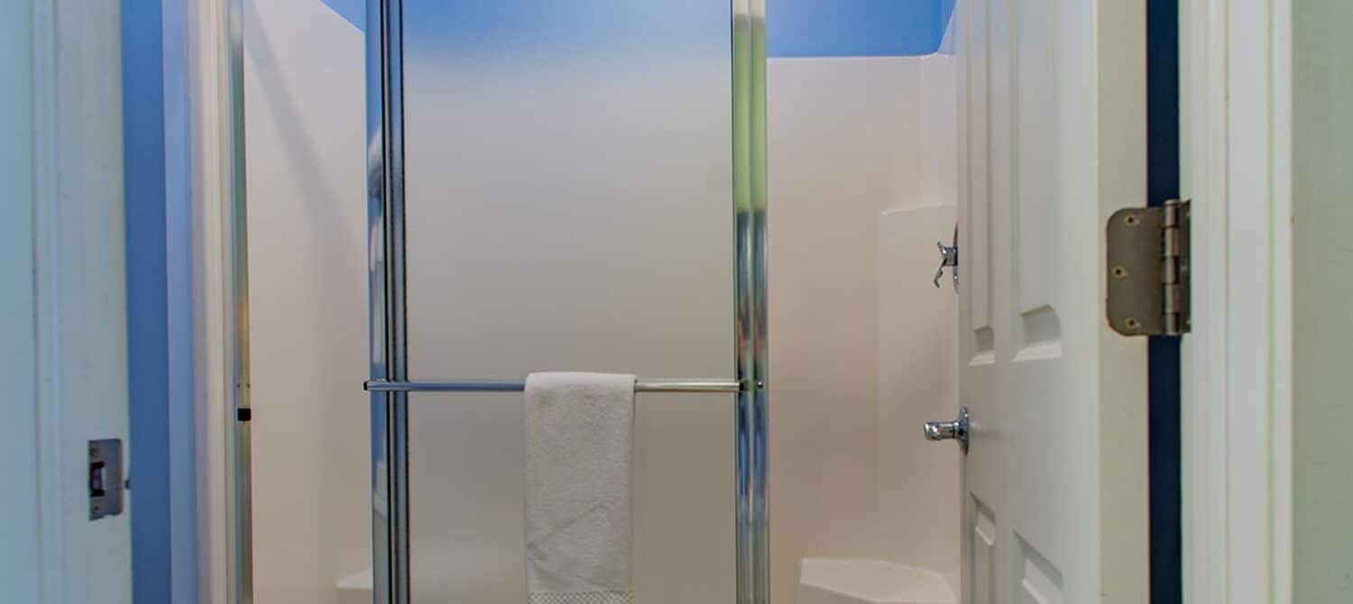 Shower with large stand up shower with sliding glass doors